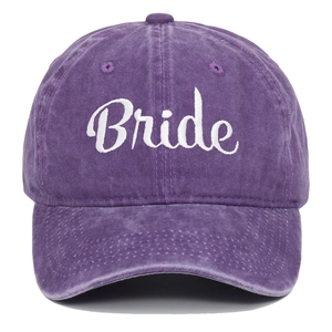 Detail shot of white Bride embroidery on a vintage purple washed cotton baseball cap