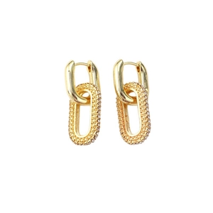 Golden double-link hoop earrings with paved crystal oval link on white background