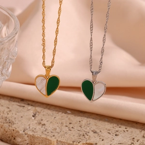 Minimalist heart pendant necklace in gold and silver with shell and green inlay