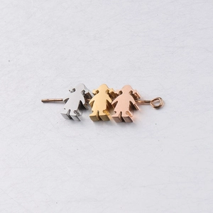 Close-up of girl-shaped stainless steel beads in silver, gold, and rose gold finishes