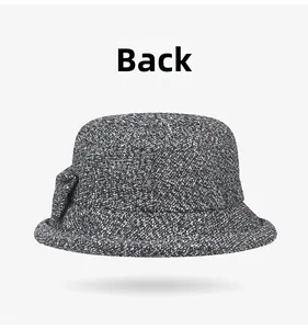 Back view of a grey wool blend bucket hat for women with a side bow decoration