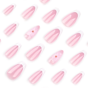 Faux ongles French roses avec relief floral 3D et design en forme d'amande