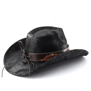Detail of western cowboy hat featuring leather strap with metal studs and petal accents
