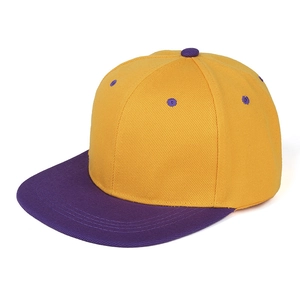 Detailed view of color-block hip hop flat brim baseball cap in yellow and purple twill cotton