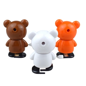 Three colorful wind-up walking panda bear toys showing mechanical back and clockwork keys