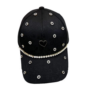 Women's black baseball cap with rhinestone heart chain and subtle jacquard fabric texture