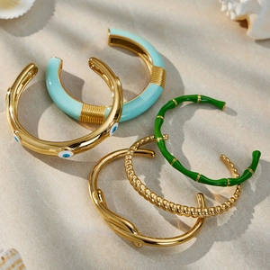 Set di bracciali rigidi dorati in acciaio inossidabile con smalto malocchio