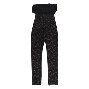 Close-up of black lace detail and dark textured pattern on form-fitting jumpsuit