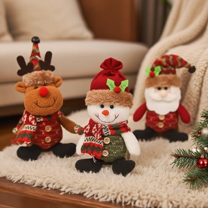 Three-piece Christmas plush doll set featuring Santa, Snowman, and Reindeer ornaments