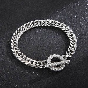 Detailed close-up of a silver stainless steel chunky chain bracelet with an OT toggle clasp