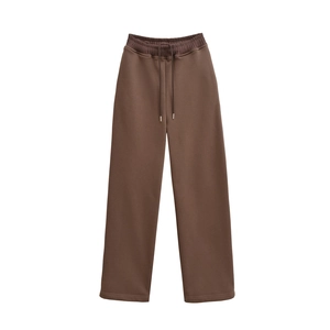 Detailed view of dark brown joggers featuring an elastic waistband and matching drawstring