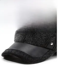 Detailed macro view of gray faux fur texture and black matte brim with silver rivet