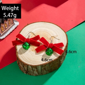 Detailed view of Christmas bow and bell earrings with 4.6cm size and 5.47g weight data