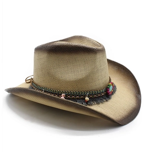 Macro shot of hand-woven straw cowboy hat featuring multi-color beads and fringe detail
