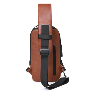 Waterproof brown faux leather chest bag for men showing adjustable back strap and texture