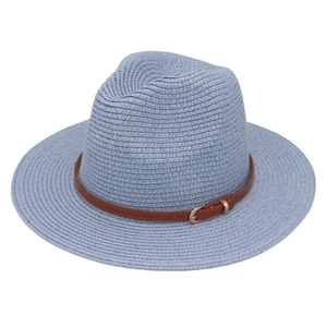 Detail of light blue straw Panama hat featuring a brown leather belt buckle strap