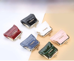 Macro display of crocodile texture coin purses in six vibrant colors with metal clasps