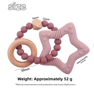 Detail view of star-shaped silicone teether with wooden rings and rose red beads