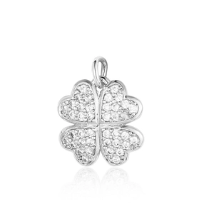 Macro shot of silver four-leaf clover pendant with sparkling cubic zirconia inlay