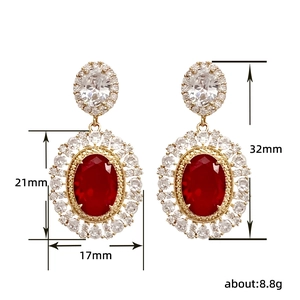Luxurious royal style red gemstone flower earrings with white crystals in gold plating