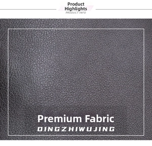 Close-up of black litchi grain faux leather material showing premium texture and durability
