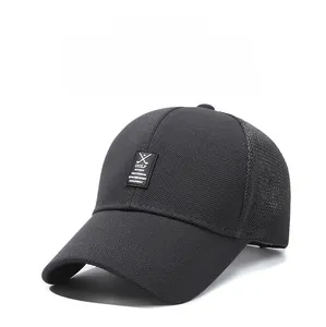 Detailed macro view of breathable mesh fabric and embroidered GOLF logo on dark grey cap