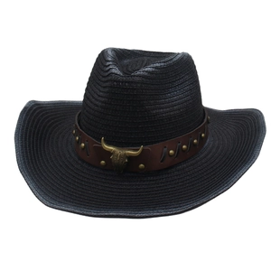 Western black woven straw cowboy hat with vintage bull head metal emblem and leather band