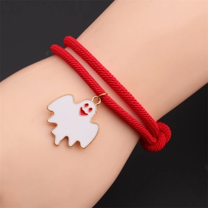 Detail of red braided Halloween ghost bracelet with alloy drip oil enamel charm