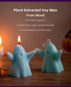 Detailed view of light blue ghost-shaped soy candles with a woody and smoky fragrance