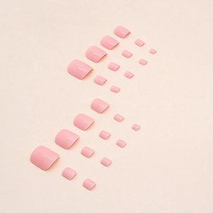 Glossy light pink press-on toenails set with 24 pieces in various sizes for summer