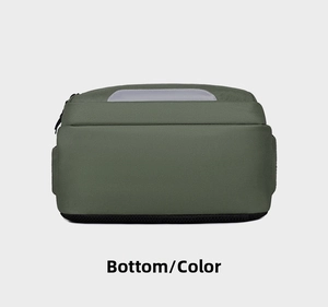 Detail of army green backpack bottom with black mesh fabric and gray reflective strip
