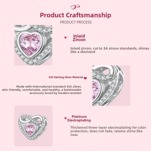 Macro detail of S925 silver heart charm with pink cubic zirconia and platinum plating
