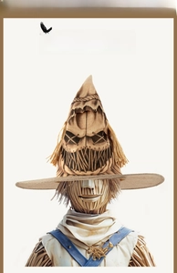 Macro detail of burlap wizard hat with scarecrow face for Halloween party cosplay