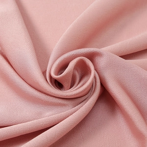 Dusty rose silk-like satin hijab scarf with smooth texture and subtle glossy finish