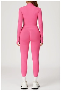 Detailed back view of seamless pink yoga set showing slimming fit and athletic texture