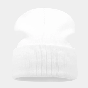 Detailed view of the pure white knitted beanie featuring wide cuff and thick texture