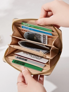 Vintage wood grain compact wallet for women featuring multi-card slots and a zipper compartment