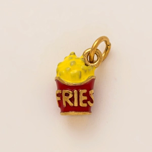 Macro shot of 18K gold plated stainless steel heart fries pendant with red enamel finish