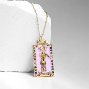 Gold sun tarot necklace with pink enamel skull pendant and colorful zircon stones