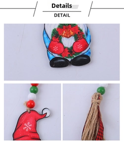 Macro detail of Christmas gnome wood hanging with red green beads and jute tassel