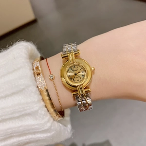 Elegant gold and silver steel band quartz watch for women with vintage Roman numeral dial