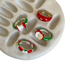 Creative enamel apple rings set in red and green colors with minimalist gold plating