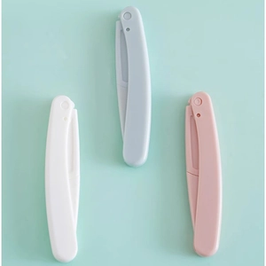 Three safety folding eyebrow razors in pink, blue, and white colors for precise grooming