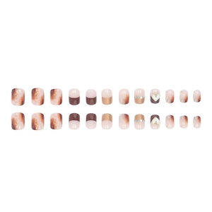 Press-on nail kit with marble amber design, gold leaf accents and 3D heart details