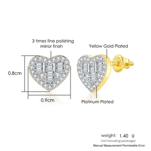 Detail view of heart stud earrings with cubic zirconia and mirror polished finish