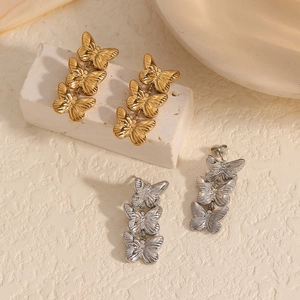 Three-tier butterfly drop earrings in 18k gold and silver finish with detailed wing texture