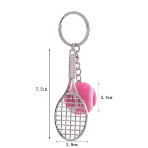 Pink tennis racket keychain dimensions: 7.5cm length, 2.9cm racket width and 2.4cm ball