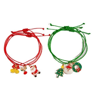 Adjustable Christmas themed woven bracelets with colorful Santa and tree alloy charms