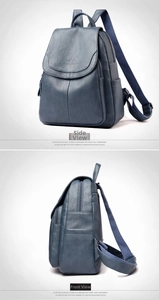 Detalle de la mochila de cuero PU azul marino con logo de canguro grabado y cremalleras
