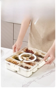 Detail of 8-compartment food organizer with silicone seal and handle for fresh storage